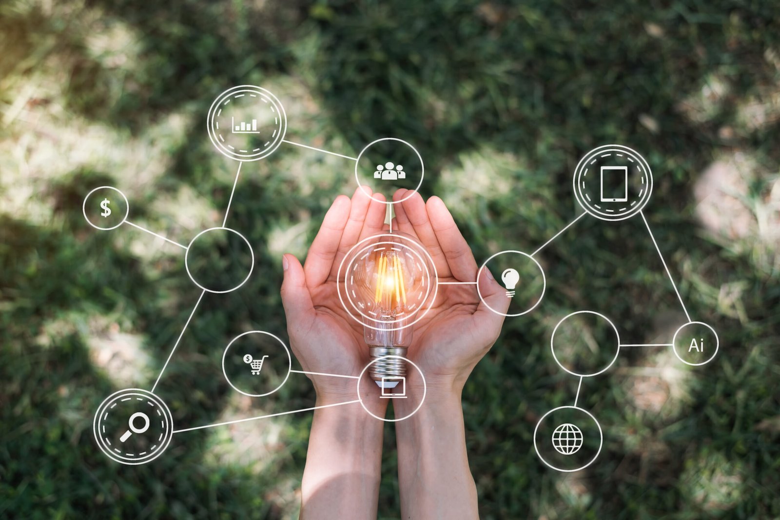 Hand holding light bulb with green background. idea solar energy